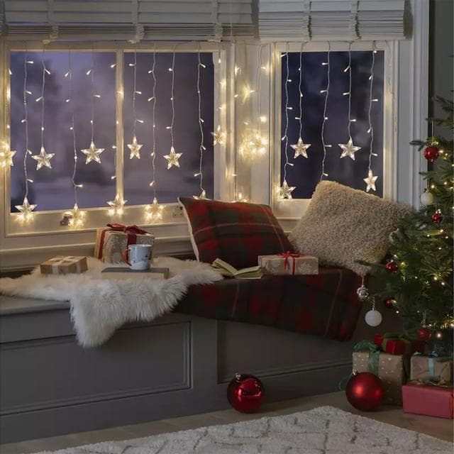 Sainsbury's Home Warm White Star Shaped Christmas Curtain Lights - gallery image 1