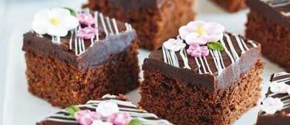 Fudgy chocolate squares decorated with sugary flowers