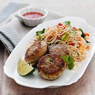 Fish cakes with a wedge of lime