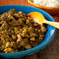 Curry served in a blue bowl