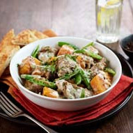 Vegetable curry served with a naan bread